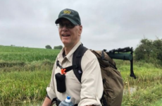 An American man is walking across Ireland to raise funds to help a Dublin boy