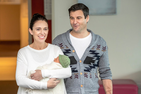 Prime Minister Jacinda Ardern and her partner Clarke Gayford with their new baby daughter in June.