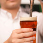 Bar manager sacked after his 11-year-old son was seen carrying pint glasses to customers awarded €3,270