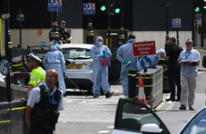London terror suspect remains in custody as UK police search three homes