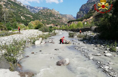 Searches continue for survivors after 'avalanche of water' hits Italian park