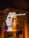 Photos of people who spoke out about Church abuse projected onto Dublin buildings