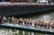 Swimmers take part in the 99th Dublin City Liffey Swim