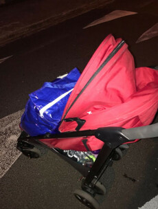 Mother and one-year-old child walk streets waiting to hear about accommodation for the night