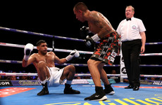 Khan survives heavy knockdown and hairy moments to dominate Vargas on points