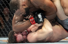 Welterweight champ Woodley hands Till first pro defeat in UFC 228 main event