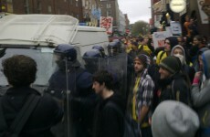 Riot gardaí clash with demonstrators in Dublin