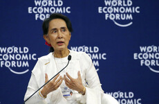 Aung San Suu Kyi defends court decision to jail two Reuters reporters