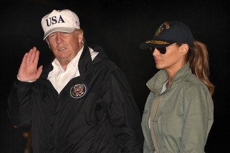 Trump and his wife Melania following a trip to Puerto Rico last year. 
