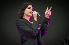 Dua Lipa cried on stage in Shanghai after young fans waving rainbow flags were dragged from the venue by security