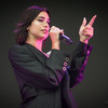 Dua Lipa cried on stage in Shanghai after young fans waving rainbow flags were dragged from the venue by security