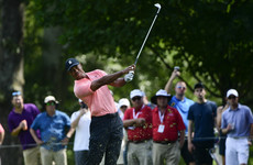 Tiger Woods seizes share of lead at Tour Championship, Rory McIlroy in the hunt