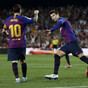 Pique rescues 10-man Barca as Messi breaks another La Liga record