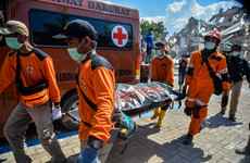 Indonesia reluctantly accepts international help as it struggles to reach 200,000 desperate victims