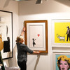 Banksy artwork self-destructs after selling for €1.2 million at London auction
