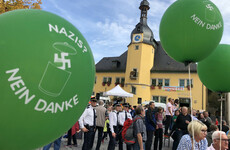 Eight police hurt in clashes at far-right gig in Germany