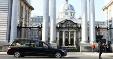 Funeral cortège of Emma Mhic Mhathúna passes by Leinster House