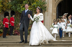 Princess Eugenie married a wine merchant in a windy Windsor Castle ceremony today