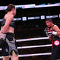 Taylor toys with tough Cindy Serrano to retain titles in Boston as a 'Notorious' fan watches on