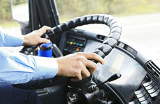 A bus driver sacked for sharing 'shock' pictures of a faulty wheel has won an unfair dismissal claim