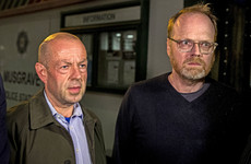What has led to two Belfast journalists looking into the Loughinisland killings getting arrested?