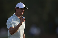 Rory McIlroy shoots 67 to surge into contention in Dubai