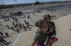 Migrants retreat as US border agents push them back with tear gas and rubber bullets