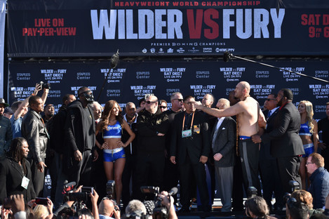 Undefeated heavyweights Deontay Wilder (left) and Tyson Fury will go head-to-head in LA on Saturday night.