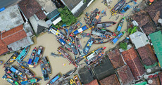 Torrential rain hampers efforts of Indonesian rescuers to reach isolated communities
