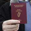 Tánaiste says TDs using their offices for passport deliveries is 'unhelpful'