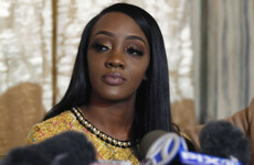 Woman suing R. Kelly for sexual battery accuses his team of threatening her with 'private photos'
