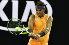 Nadal overcomes slow start to progress in Melbourne as Sharapova books clash with rival Wozniacki