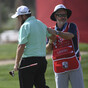Lowry recovers from 'horrendous' start to retain narrow lead in Abu Dhabi