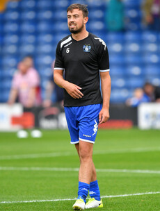 The last Irishman to play a Champions League game is on the hunt for promotion in England