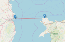 Construction on a Welsh nuclear power station 105 km from Ireland is being frozen