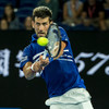 Djokovic survives scare to advance to Australian Open quarter-finals