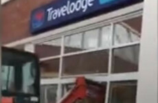 Digger smashes through front of Travelodge hotel in Liverpool