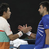 Epics take their toll as Nishikori injury puts Djokovic one step closer to Australian Open record