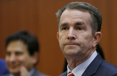 US governor apologises over appearing in 'clearly racist and offensive' photo