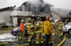 Plane crashes into California home, killing five people