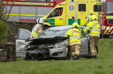 Garda rescues couple and baby from overturned car just before it catches fire