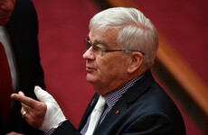 Australian police probe parliament brawl involving 70 year-old senator who left blood on rival's door