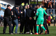 Furious Pochettino confronts referee Mike Dean after defeat at Burnley