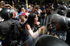 Guaido supporters square up to Venezuelan police amid electricity blackout