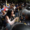 Guaido supporters square up to Venezuelan police amid electricity blackout