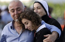 'Broken hearted but not broken': New Zealanders unite in two-minute silence for mosque victims