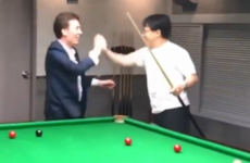 Hollywood actor Jackie Chan impresses Ken Doherty with trick shot