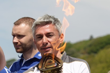 Jonathan Edwards holds the torch. 