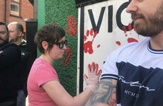 Friends of Lyra McKee put red handprints on dissident republican group's office