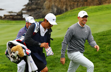 McIlroy five back as Woodland produces gritty display to retain US Open lead